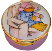 Paddington Bear Sipping Cocoa (Crummles) 1.62" diameter. Inside Lid: "Paddington always looked forward to his elevenses" Bottom stamped: Paddington & Co Ltd Eden Toys Inc. and the Crummles stamp.